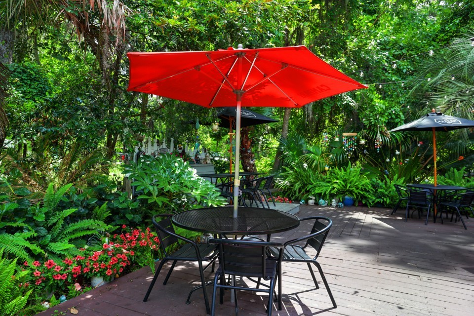 Driftaway Cafe garden patio with tables and umbrellas